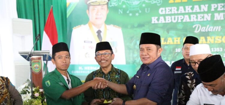 menghadiri Apel Akbar Gerakan Pemuda (GP) Ansor Kabupaten Musi Banyuasin